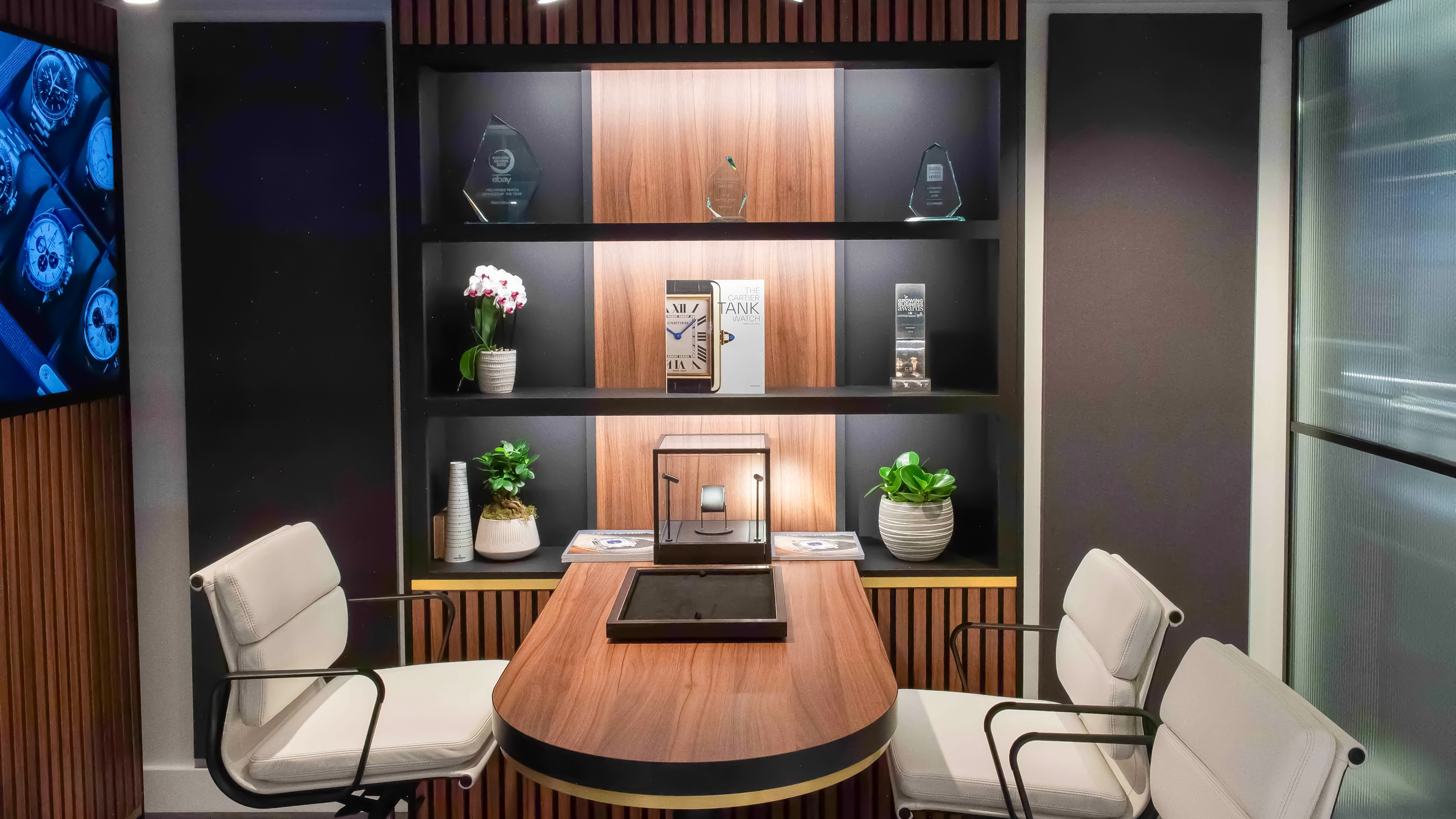 Interior consultation view of the Watchfinder & Co. store at London’s Royal Exchange, designed and built by Attero Retail Design Agency. The space blends premium materials, bespoke joinery, and refined lighting to create a luxury retail environment for personalised client experiences.